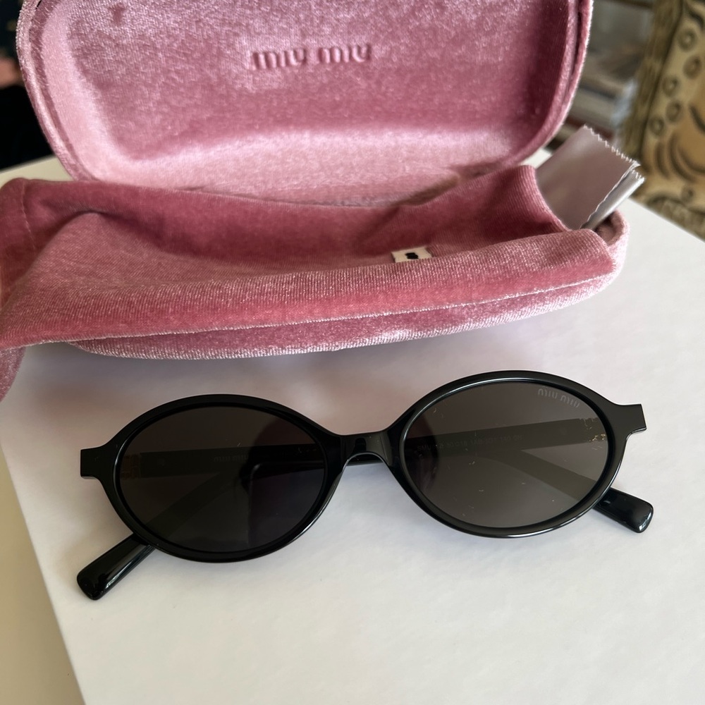 Miu Miu 01XV Black Sunglasses – Oval Frame, Bold & Sculptural, Authentic
